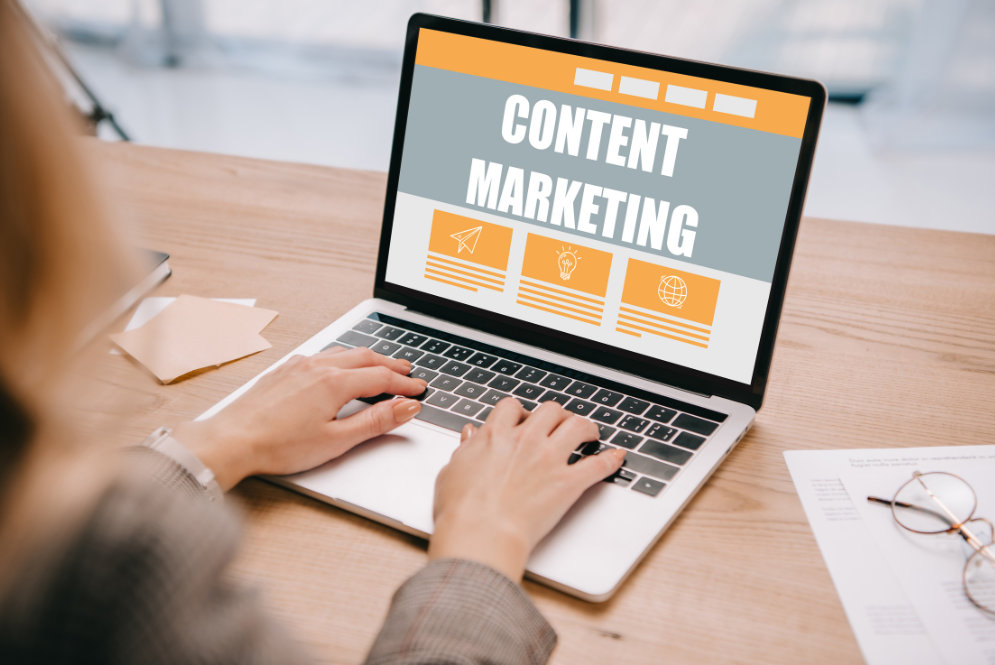 A laptop displaying "Content Marketing" - therapy marketing success