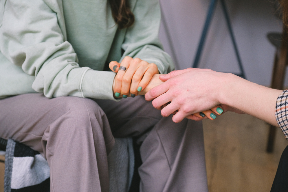 Two women holding hands - The Private Practice Pro